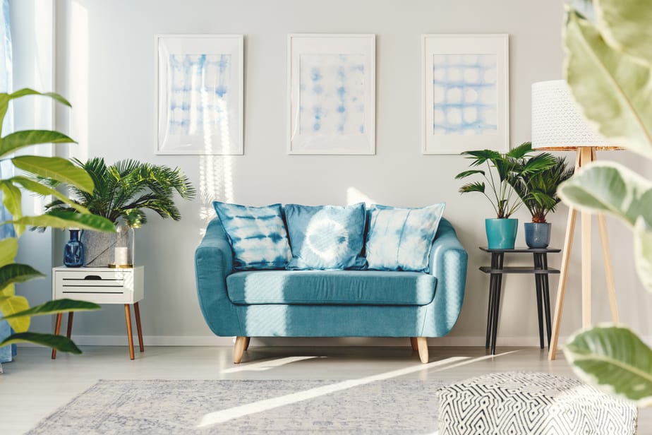 Bulky, Mini Blue Couch in A Living Space