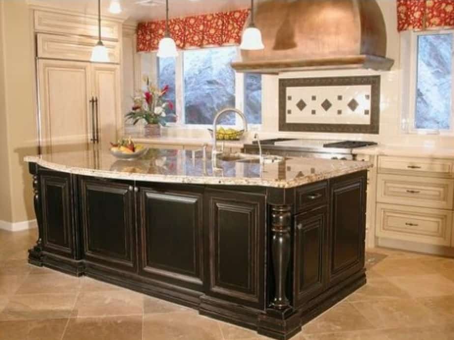 Kitchen Island with Some Faucets in Sink