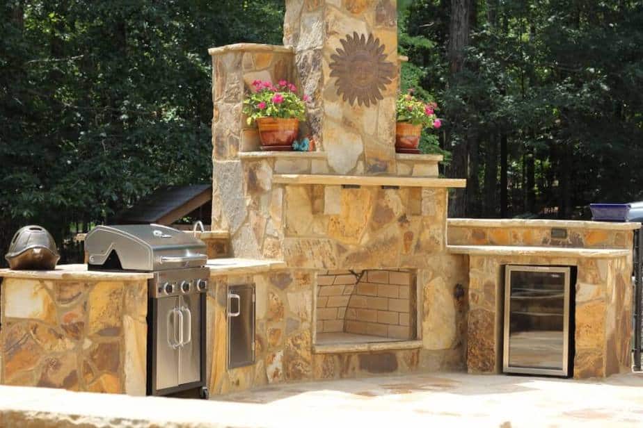 Outdoor Kitchen with Beautiful Fireplace