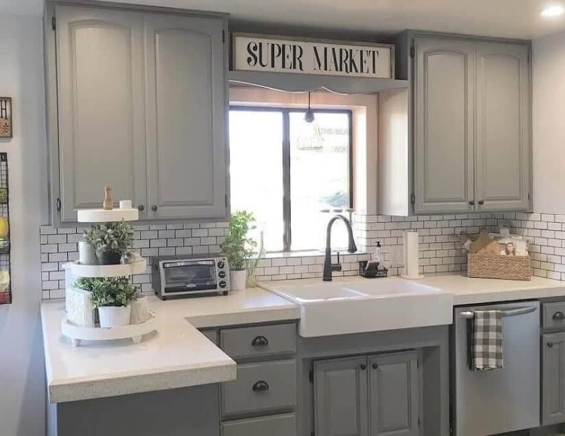 Greyscale Kitchen Cabinet with Subway Tile Backsplash