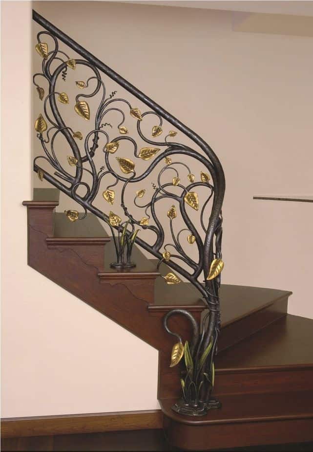 Decorative iron railing with gold accents